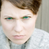 woman with green-eyed envy