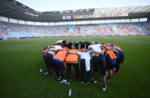 women in a huddle